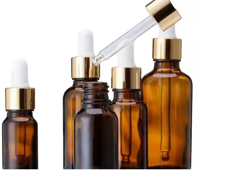 Verpakking van essentiële oliën 1OZ 2OZ 20ml 30ml 50ml Amber essentiële olieserum Glasdruppelfles met kinderdichte dop