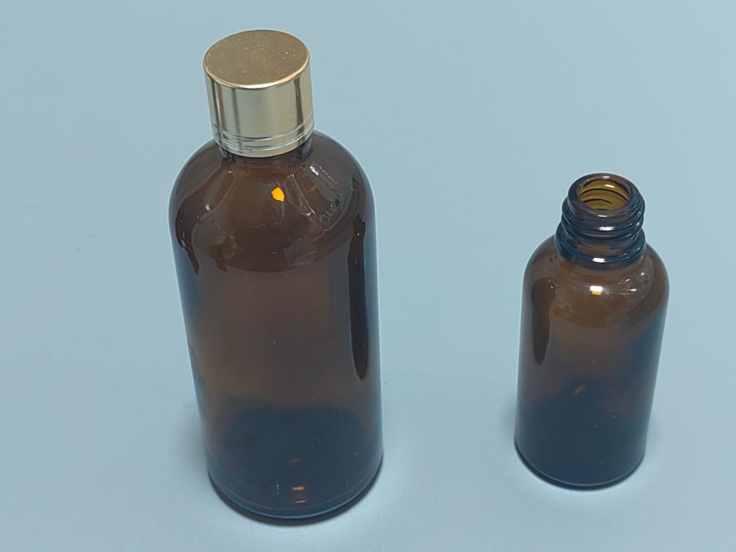 Verpakking van essentiële oliën 1OZ 2OZ 20ml 30ml 50ml Amber essentiële olieserum Glasdruppelfles met kinderdichte dop