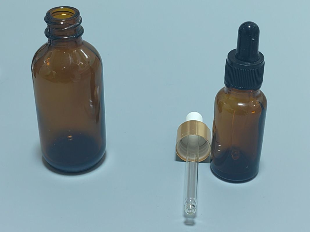Verpakking van essentiële oliën 1OZ 2OZ 20ml 30ml 50ml Amber essentiële olieserum Glasdruppelfles met kinderdichte dop